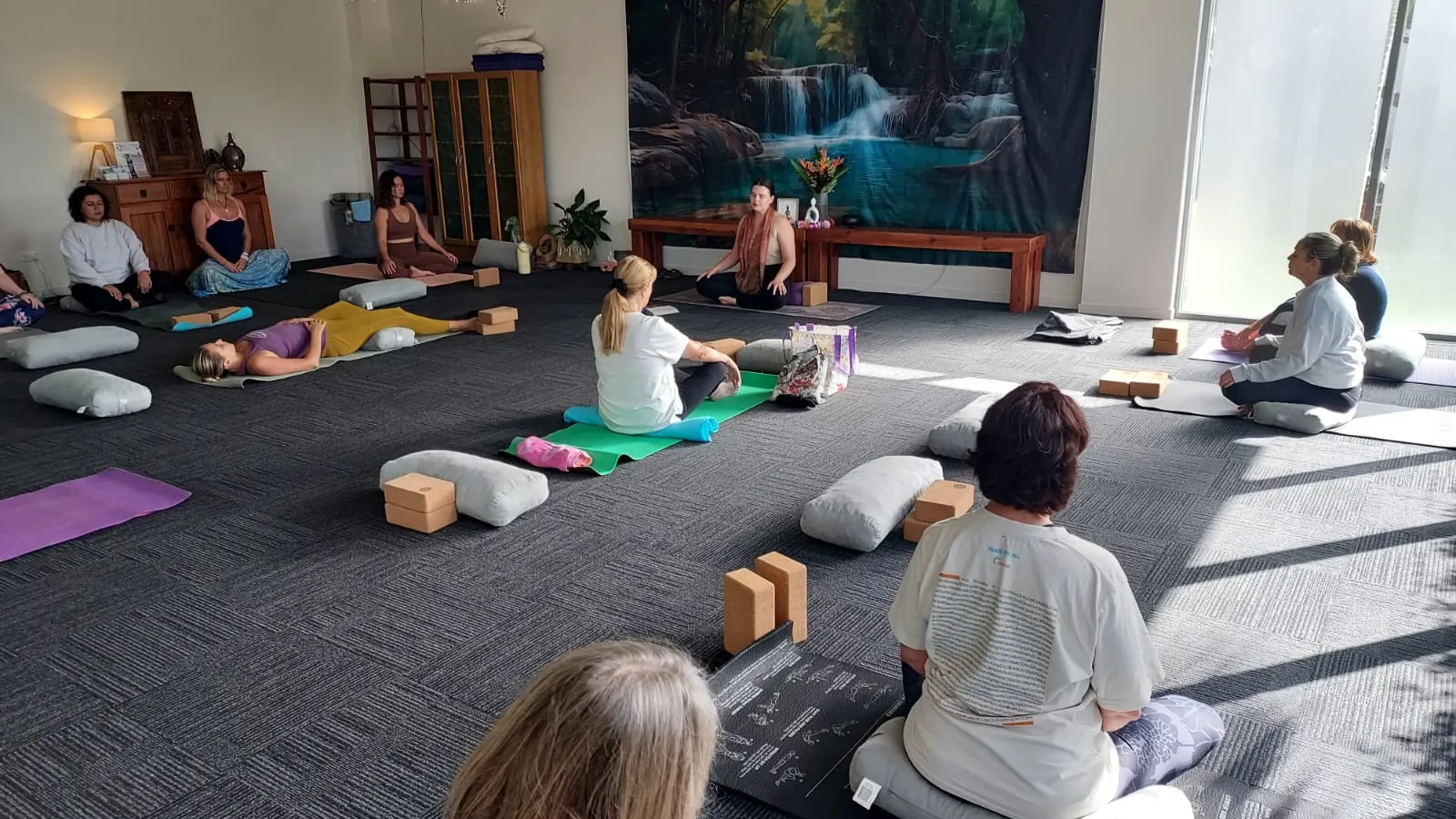Alicia Grace teaching a yoga class at Health Hub Tweed Coast.